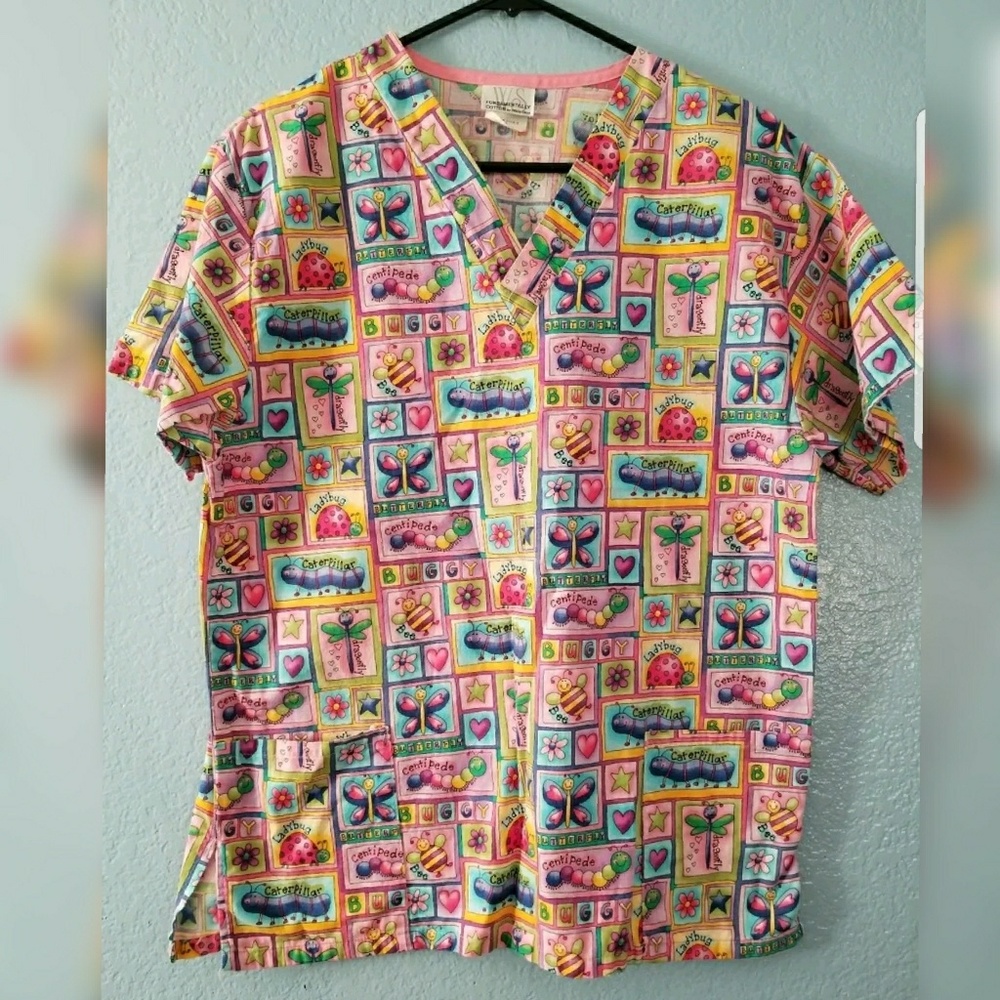 white swan scrubs top small bugs print multicolor
